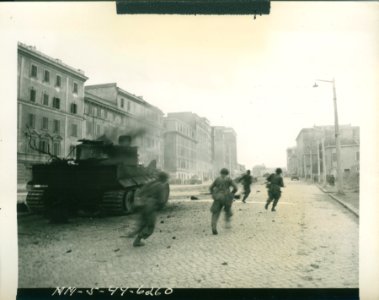 American infantrymen supported by tanks are seen fighting …