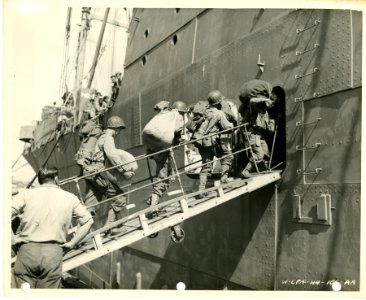 Men of the 32nd Inf Bn., 7th Infantry Division, boarding t…