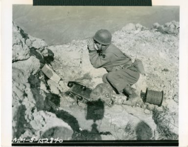 Lt. Michael J. Ciaglo, artillery observer at his post atop… photo