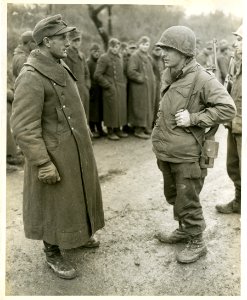 Pfc. Ernest Grumbacker, 715 W. 170th St., NYC, acting as i…