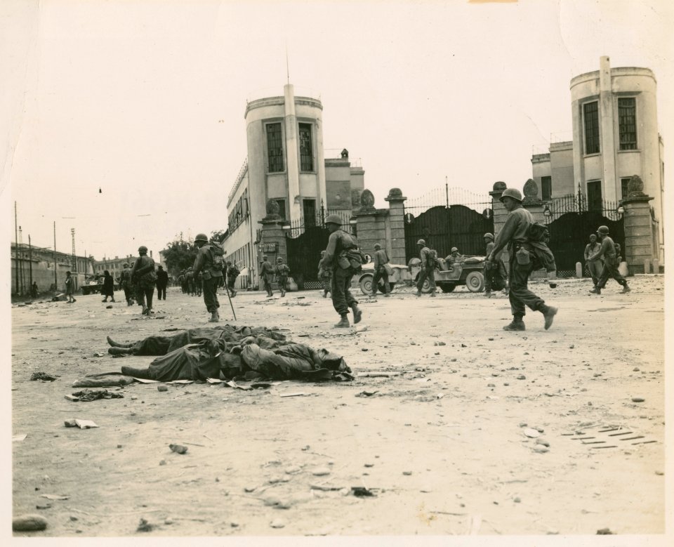85th Infantry Division troops pass dead Germans in Verona,…