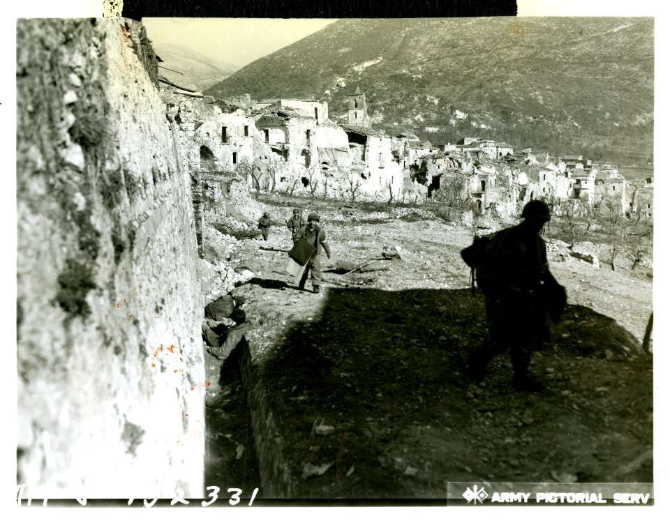 Weary American infantrymen enter San Vittore, now quiet wi…
