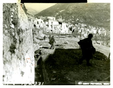 Weary American infantrymen enter San Vittore, now quiet wi…