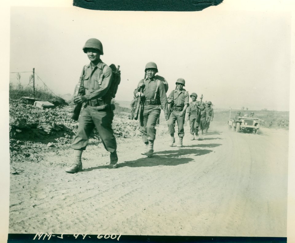 Japanese-American infantrymen moving up to the front near …