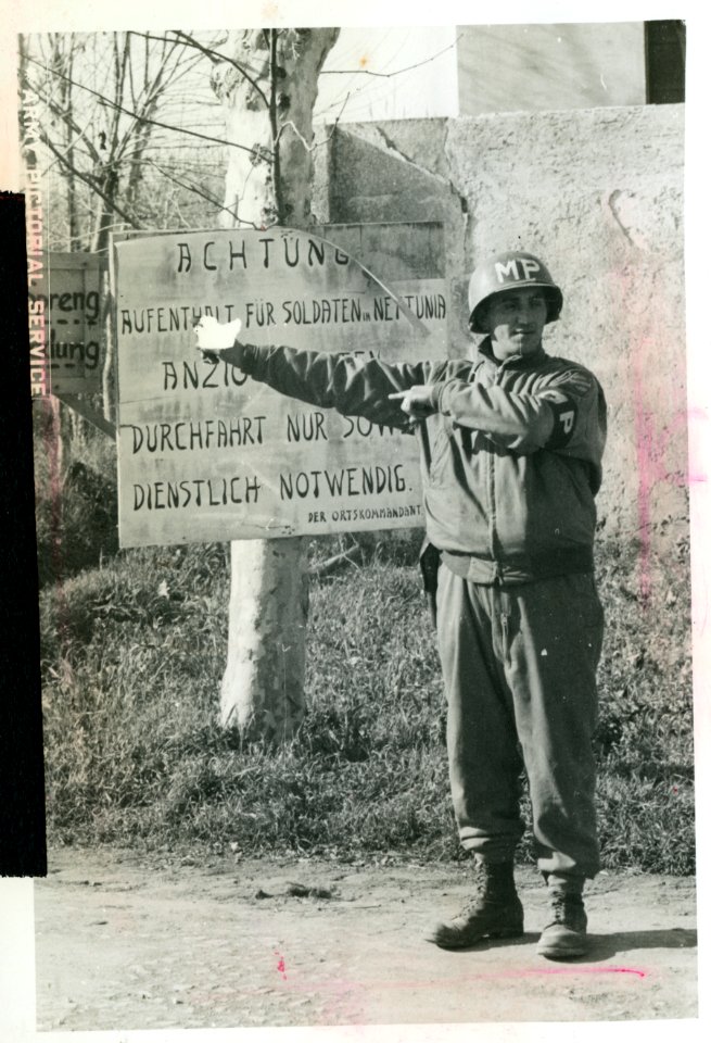 M.P. Albert Cardillo, Providence, standing in front of a G…