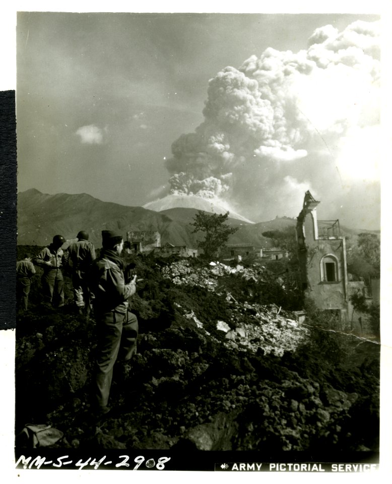 Mt. Vesuvius belches huge clouds of smoke and volcanic ash…