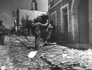 SC 192269 - As two infantrymen station themselves near the…