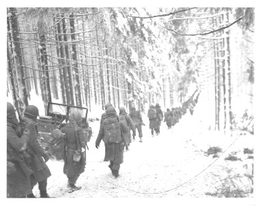 SC 199406 - American soldiers of the 75th Division march a…