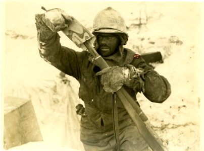 Pvt. Albert Hart, 15 French St., Methuen, Mass. puts an em…