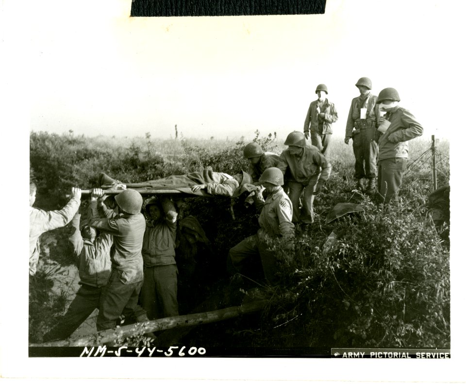 American infantry medics bring in the wounded either by st… photo