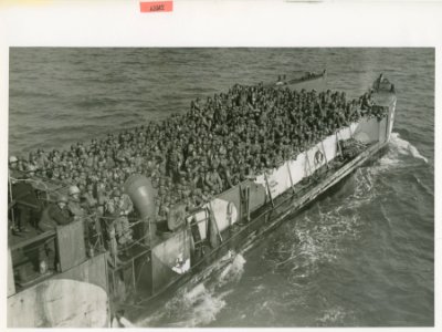 Soldiers of the 2nd Infantry Division aboard a Navy LCI of…