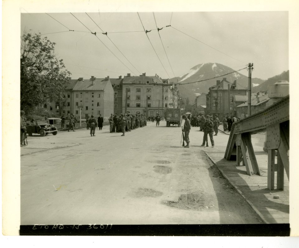 3rd Inf. Div. troops gather in German P.W.s on main street…