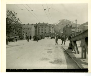 3rd Inf. Div. troops gather in German P.W.s on main street… photo