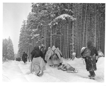 SC 199507 - American troops drag a heavily loaded ammuniti…
