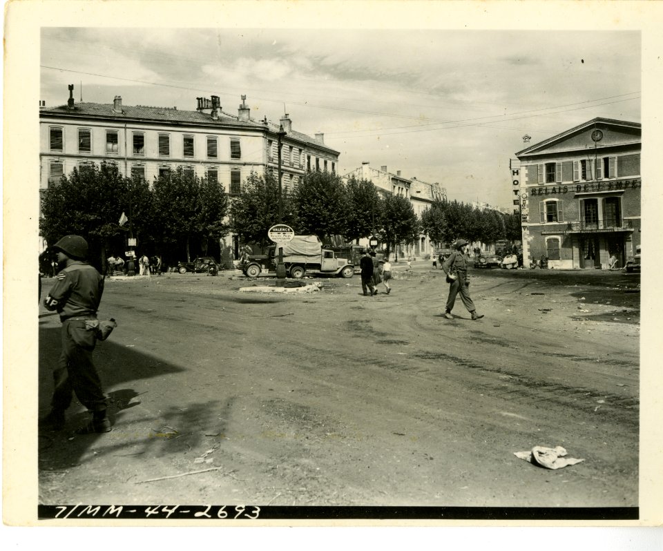 View of main street in Montelimar, littered with damage af…