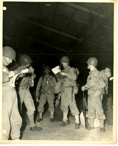 Men of 'C' Company, 32nd Inf. Bn. being checked by army an… photo