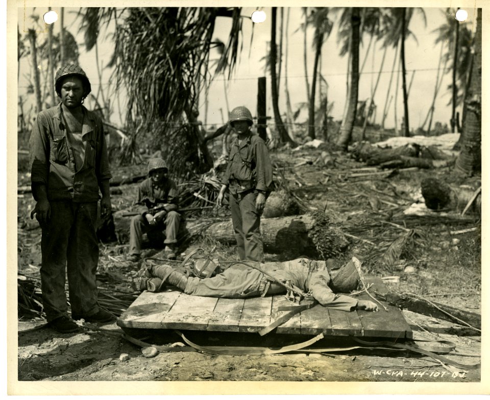 Dead Jap soldier put on sled by men of the 7th Div. U.S. A…