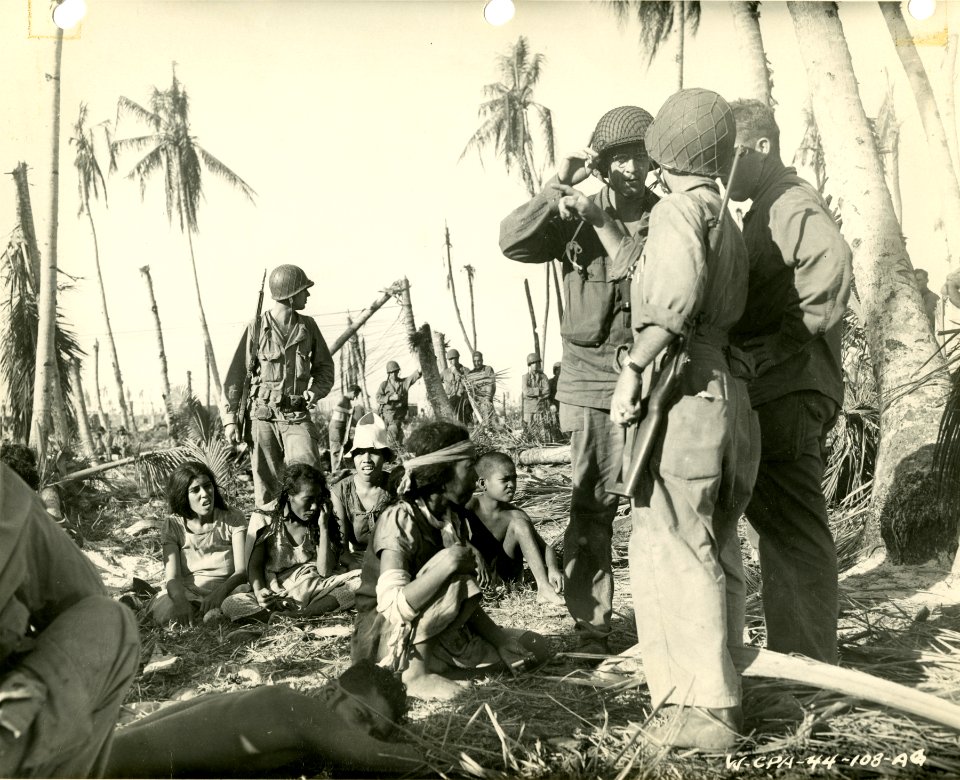 Marshallese natives being given food and medical treatment…