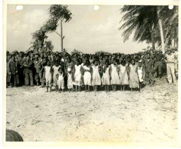 American soldiers with natives on Kwajalein, 1944 photo