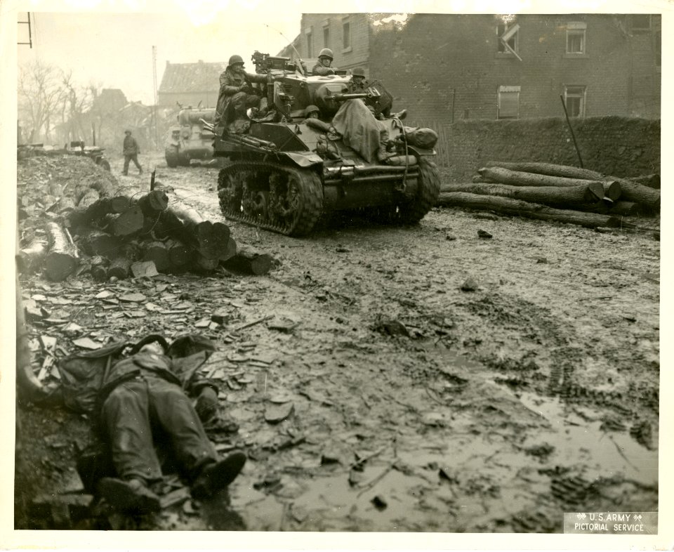 US Armored Division tank brings wounded German soldier int…