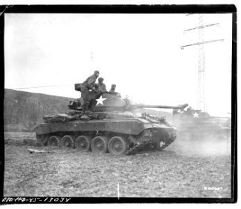 SC 200667 - Tankmen fire the 75mm gun on a new light T-24 … photo