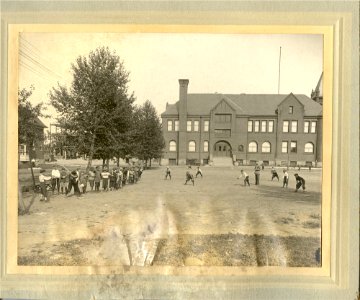 City Champion Team playing baseball in front of Central Sc… photo