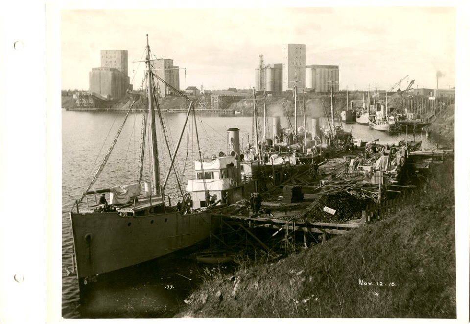 Equipping boats at dock photo