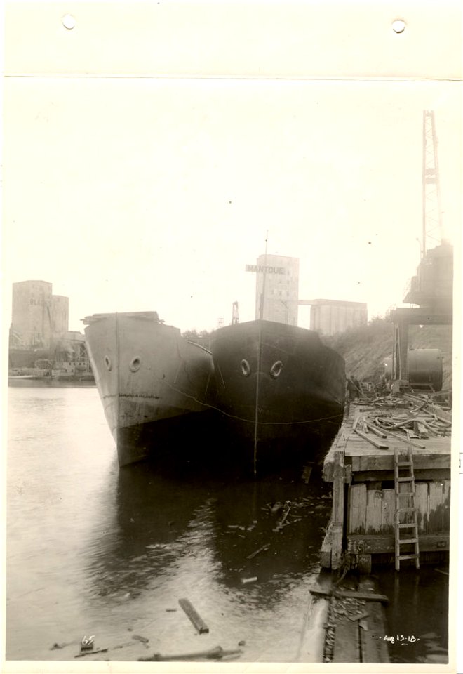 Dock view after launching [dark-hulled ship is "Mantoue"]