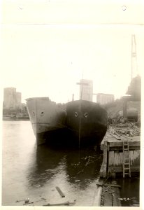 Dock view after launching [dark-hulled ship is "Mantoue"] photo