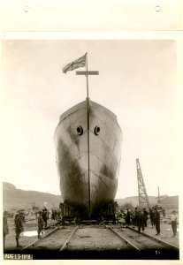 Bow view "Mantoue" on trucks photo