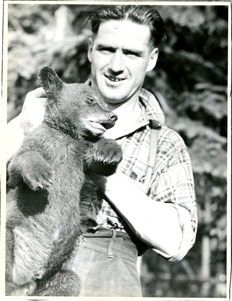 Man and Bear Cub