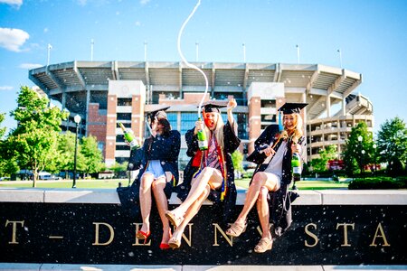 Student sitting graduate photo