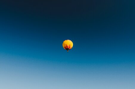 Yellow hot air balloon blue