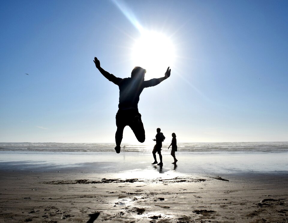 Woman silhouette beach