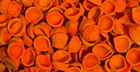 Diwali earthenware orange lamp