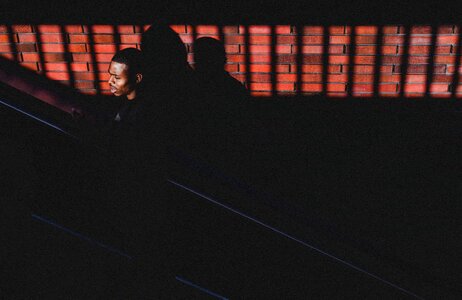African american escalator dark