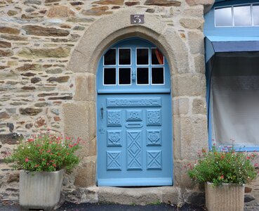 Painted blue old house carved door