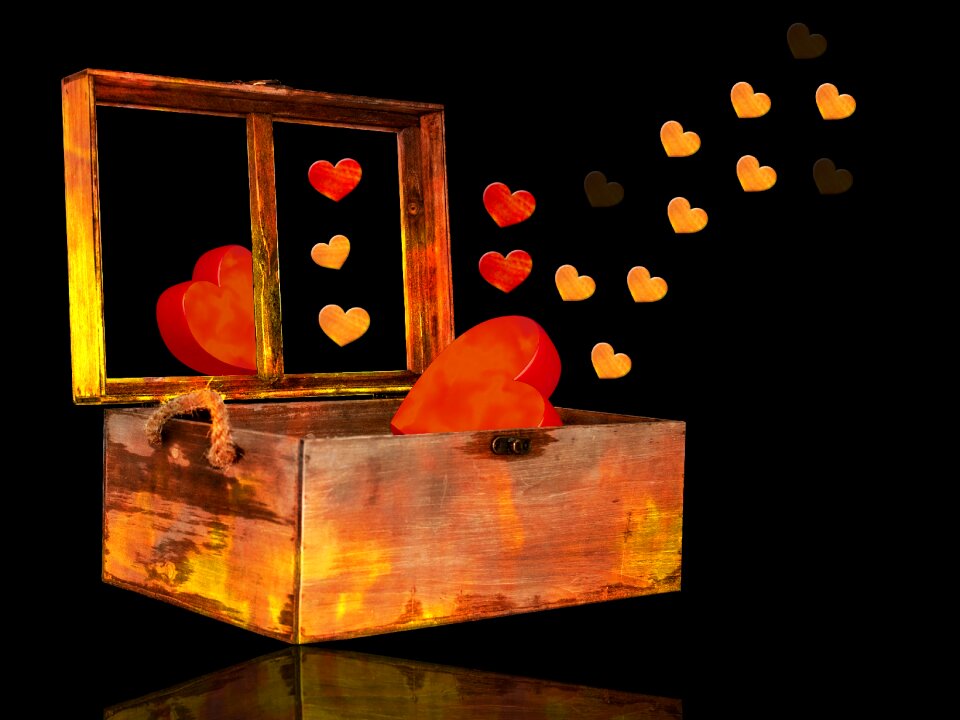Box of hearts heart black background