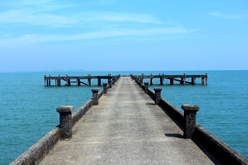 Pier beach sky photo