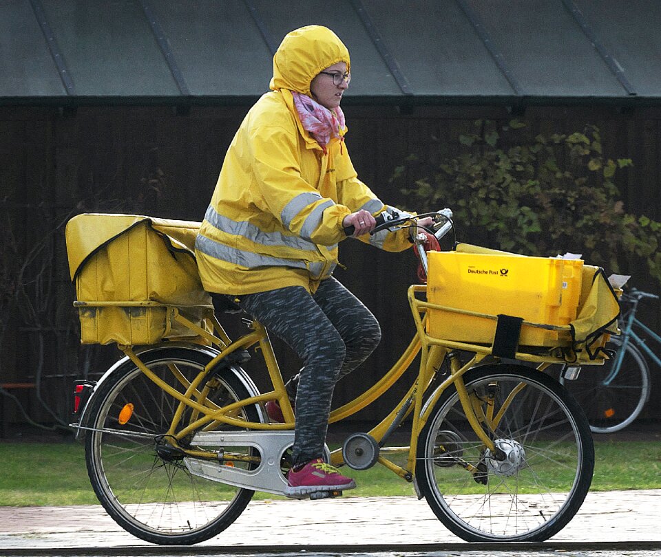 Mailwoman bike delivery