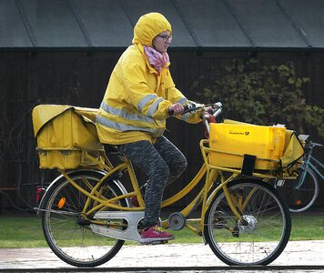 Mailwoman bike delivery