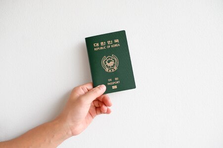 Korea passport republic of korea passport hand photo