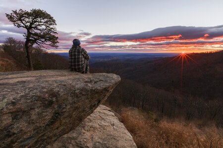 Hiker trekking cliff