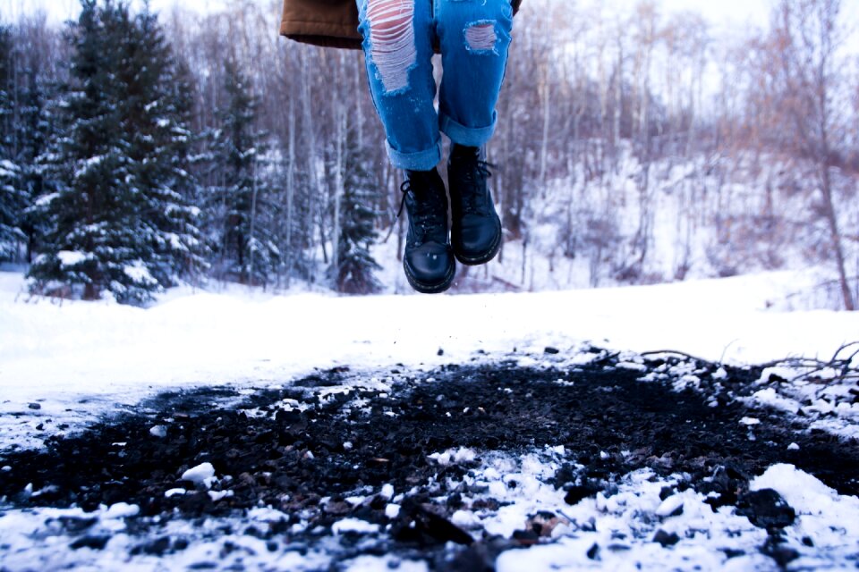 Snow boots ripped jeans