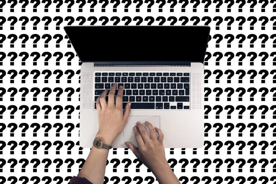 Hand question mark note