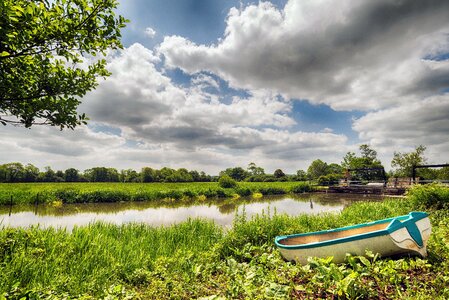 Water boat clouds photo