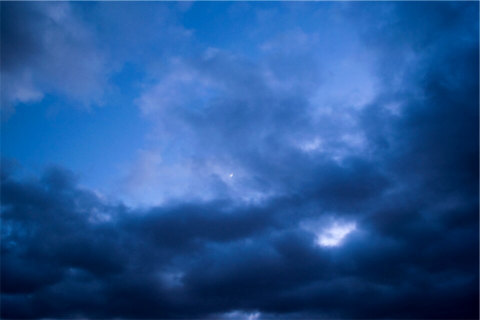 Clouds dark blue moon