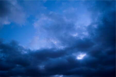Clouds dark blue moon photo