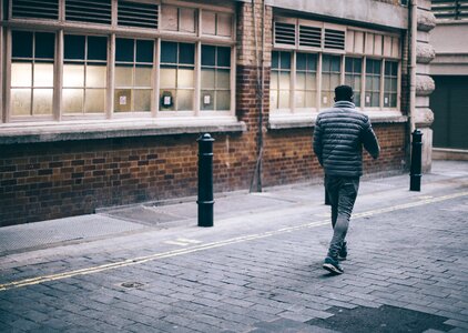 Guy walking alone photo