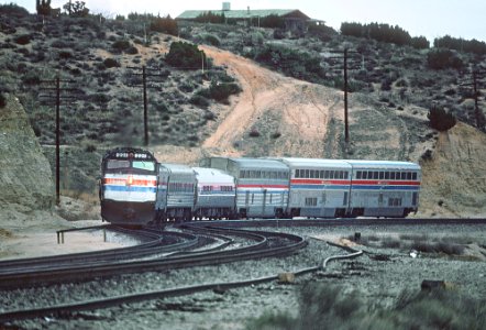 AMTK 221 with the Desert Wind, Westbound near Lugo, CA in February 1981 (31969558795)